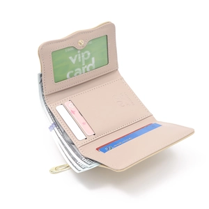 Detailed interior of pink PU leather tri-fold wallet with card slots and zipper pocket