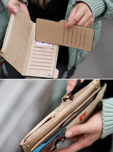 Detail view of long beige wallet showing multiple card slots and internal zipper pocket