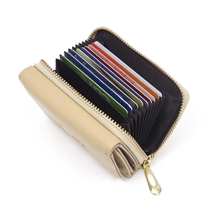Beige PU leather accordion wallet with multiple card slots and gold zipper closure