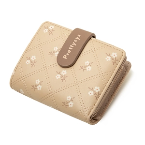 Short floral PU leather wallet for women featuring beige quilted design and snap closure