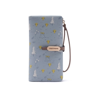 Close-up of long PU leather wallet with mushroom prints and a gold PRETTYZYS buckle