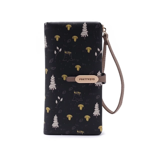 Detail of black PU leather wallet with forest pattern and brand buckle logo