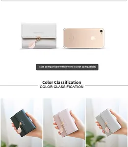 Compact tri-fold PU card wallet with leaf pendant shown alongside iPhone 8 for scale