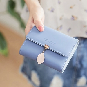 Women's light blue PU leather tri-fold wallet featuring a stylish leaf pendant buckle