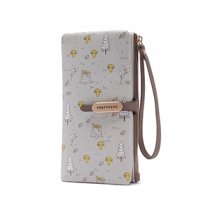 Detail of grey PU leather wallet featuring forest prints and metal snap closure