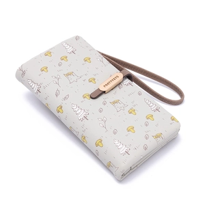 Detail of forest mushroom print on PU leather long wallet with wrist strap