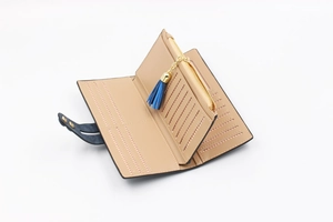 Detail view of women's long wallet featuring multi-card slots and zippered coin pouch