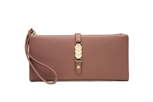 Detail of mauve faux leather wallet featuring a woven wristlet and gold metal accents