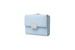 Macro shot of light blue PU leather wallet with quilted pattern and gold buckle detail