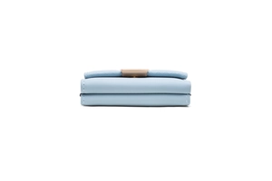 Detailed side view of light blue tri-fold wallet showing stitching and gold buckle