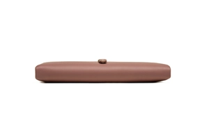 Detailed side view of elegant pink long wallet with premium lychee grain leather texture