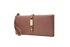 Detail view of pink long wallet with three gold round charms and a matching wrist strap
