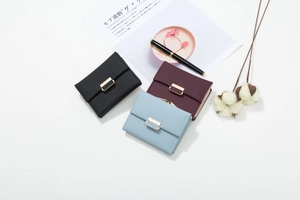 Three-fold plaid wallet for women with golden metal buckle in black, red, and blue colors