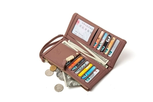 Detailed view of the organized interior card slots and zipper compartment of a pink PU purse