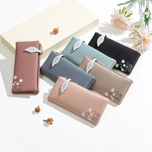 Women's long PU leather wallet featuring daisy embroidery and leaf zipper pull in six colors
