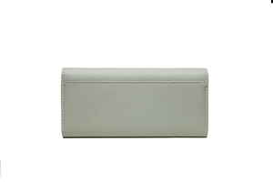 Close-up of the delicate faux leather texture and elegant stitching on the long wallet