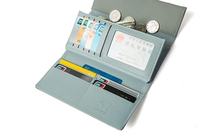 Detailed interior of long multi-slot faux leather wallet with card holders and coin pocket