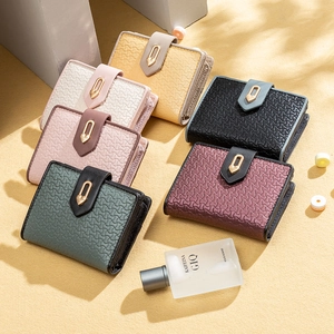 Portafogli donna in pelle PU in sei colori con fibbia a cuore in metallo e multi-scomparti