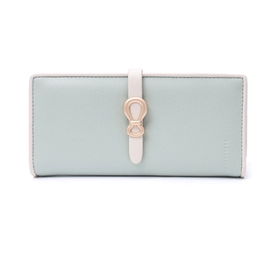 Close-up of mint green crossgrain faux leather wallet with golden bow buckle detail