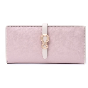 Close-up of pink textured leather wallet with gold bow clasp and embossed logo detail