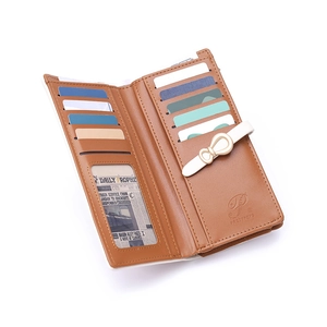 Close-up of brown PU leather wallet interior with multiple card slots and ID window