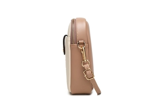 Side view of two-tone mini crossbody phone bag with gold zipper and adjustable strap