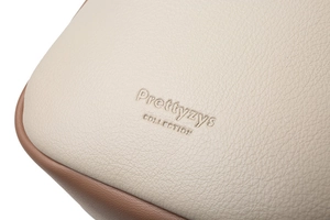 Detail of cream lychee leather mobile bag with brown piping and embossed logo