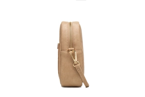 Detail shot of the side profile featuring a smooth zipper and fine stitching on the bag