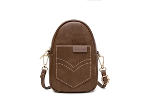 Detail of lychee pattern PU leather phone bag with contrast stitching and gold hooks