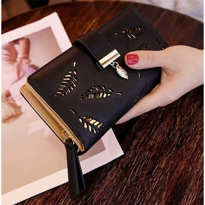 Long black leather wallet for women with hollow leaf pattern and gold metal clasp