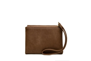 Detailed view of brown textured leather wristlet wallet with a golden metal zipper