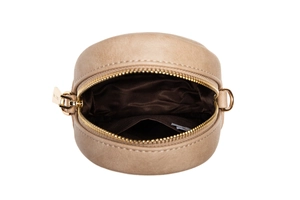Detailed interior view of beige PU leather crossbody bag with lining and inner pocket