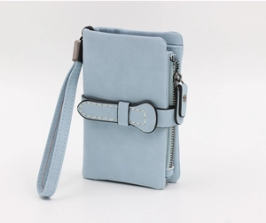 Detail of light blue short PU leather wallet with zipper pocket and wrist strap