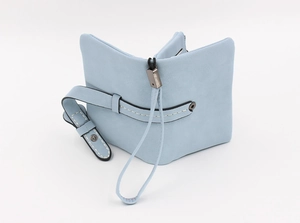 Detailed view of light blue foldable faux leather wallet with multiple card slots