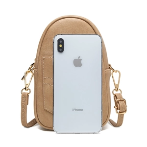 Vertical khaki pebble leather crossbody phone bag shown next to a smartphone for scale