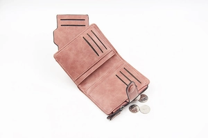 Detail view of pink PU leather wallet showing multiple card slots and zipper coin pocket