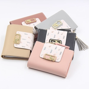 Short PU leather wallet for women with leaf pattern, metal buckle and tassel zipper