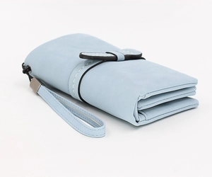 Light blue long matte wallet with folding structure, card slots and bow detail