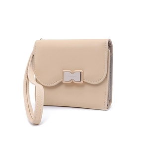 Women's minimalist PU leather short wallet in beige with a gold bow buckle and wrist strap