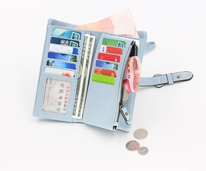 Detail view of light blue long PU wallet showing multiple card slots and coin pocket