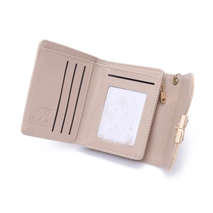Three-fold beige faux leather wallet for women with card slots and heart zipper pull