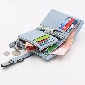 Three-fold light blue PU leather short wallet showing cards and cash compartments