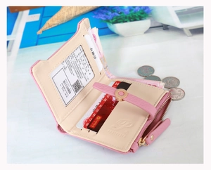 Pink faux leather short wallet interior showing card slots and side zipper coin pocket