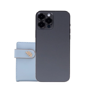 Close-up of a light blue leather wallet with a gold leaf clasp shown next to a smartphone