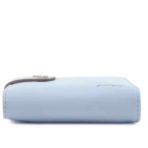 Detail of light blue faux leather wallet featuring a cute golden bear metal buckle closure