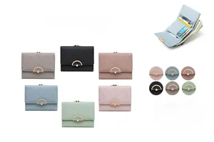 Detail view of tri-fold women wallet with card slots and metal magnetic buckle