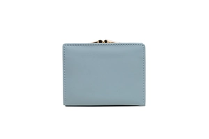 Detail of grey-blue kiss-lock wallet showing premium stitching and gold metal hardware