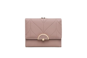 Detail of dusty pink trifold wallet featuring leaf stitching and golden flower clasp