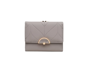 Close-up of grey PU leather short wallet with leaf quilting and gold metal buckle