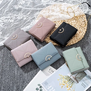Close-up of stylish PU leather trifold wallets in six soft colors with gold metal buckles